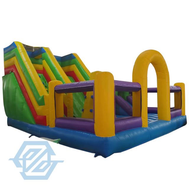 Carrera de obst&aacute;culos con tobog&aacute;n inflable con muro de escalada Casa de rebote